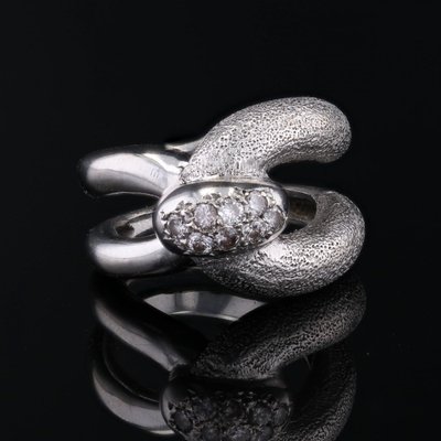 Bague or blanc diamants agrafe
