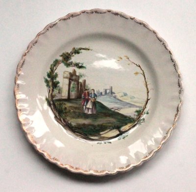 Assiette en faïence de Marseille à décor de paysage, 18e s.