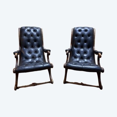Pair of English chesteefield armchairs in black leather