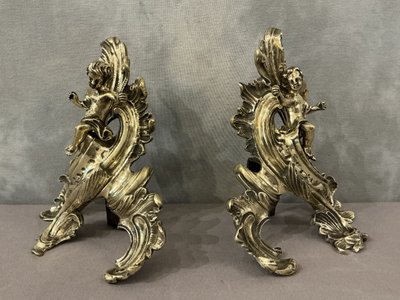 Paire de chenets en bronze d'époque 19 ème à décor de petits amours 