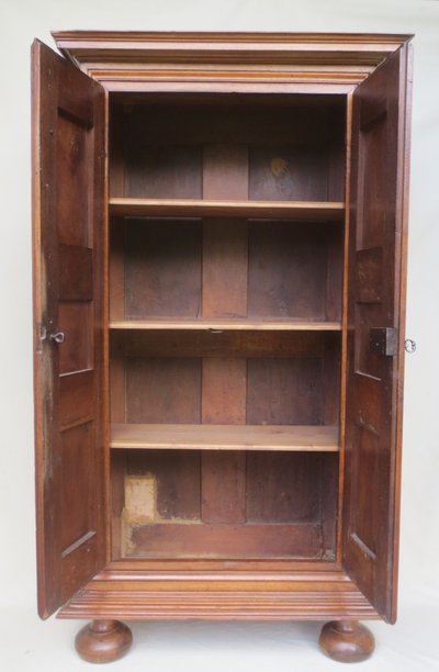 Walnut armoirette, 17th century.