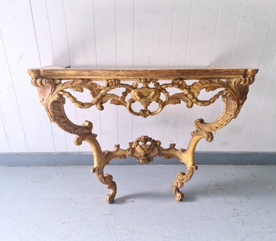 Console en bois doré époque Louis XV