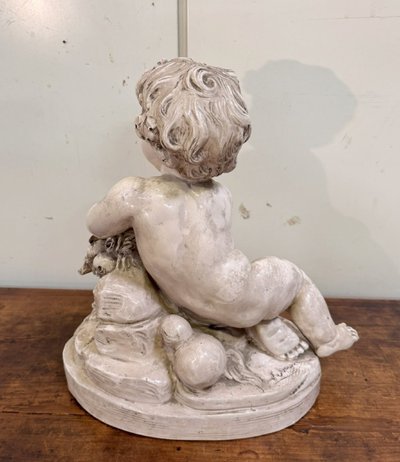 Lebrun : Putti en terre cuite émaillée
