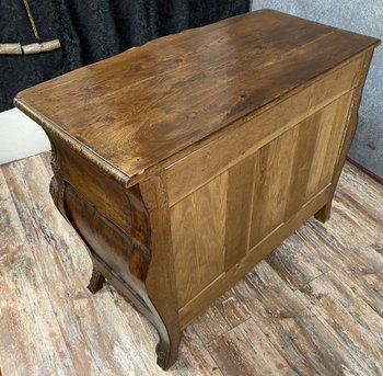 Commode Louis XV provençale galbée en bois naturel vers 1880-1900