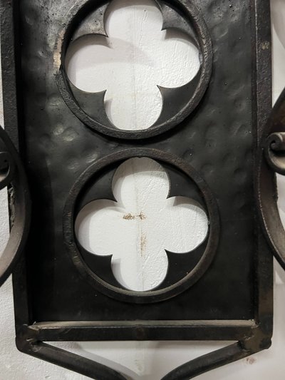 Set of three Renaissance-style wrought iron wall sconces, 20th century