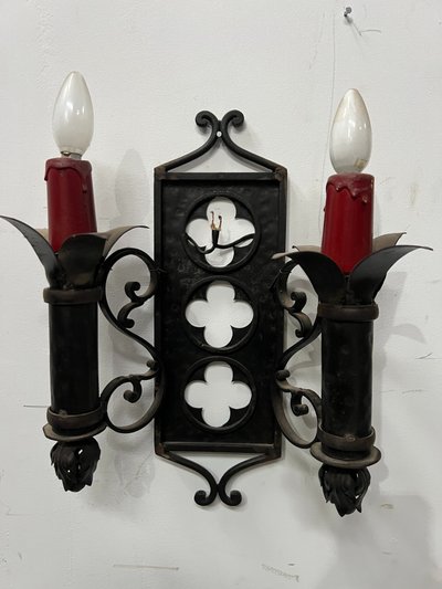 Set of three Renaissance-style wrought iron wall sconces, 20th century