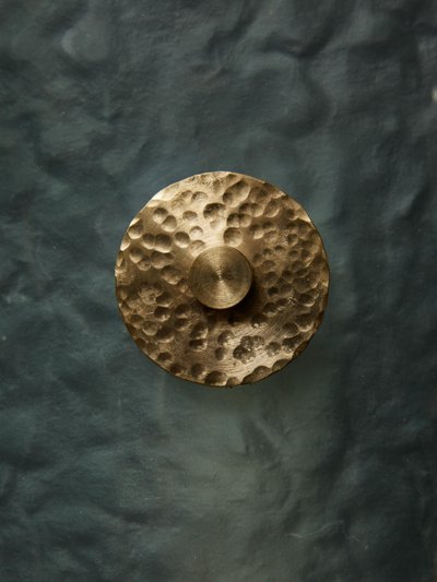 Teal Murano wall light with brass accents