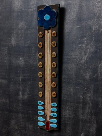 Thermomètre en céramique de Mithé Espelte avec motif de fleur