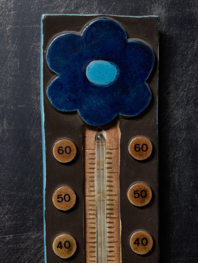 Thermomètre en céramique de Mithé Espelte avec motif de fleur