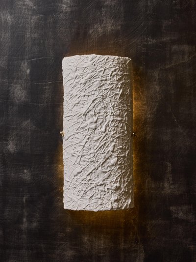 Coppia di applique in gesso curvato