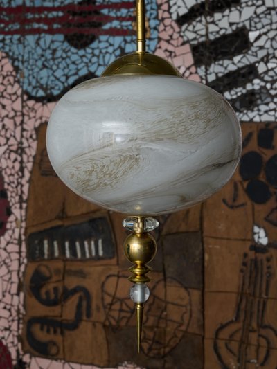 Brass pendant lights with painted glass globes