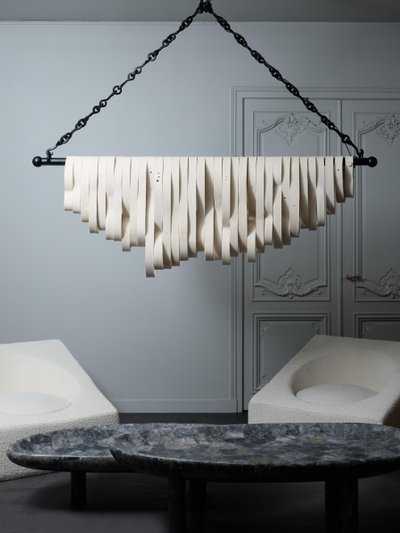 Long iron and ceramic chandelier by Olivia Cognet