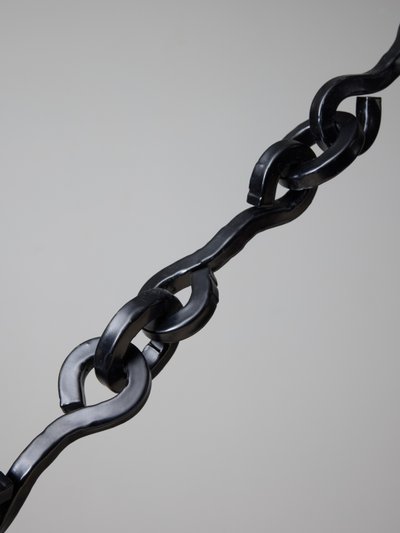 Long iron and ceramic chandelier by Olivia Cognet