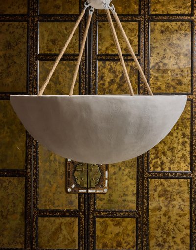 Plaster chandelier with interior lighting