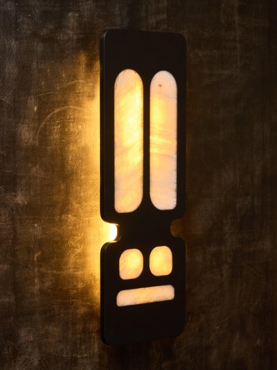 Crystal wall lights in slate and stone by Glustin Luminaires