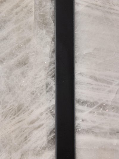 Crystal wall lights in slate and stone by Glustin Luminaires