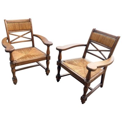 Paire de fauteuils néo rustique en chêne circa 1950