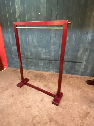 Due appendiabiti in legno tinto e ottone 1970/1980 ca.