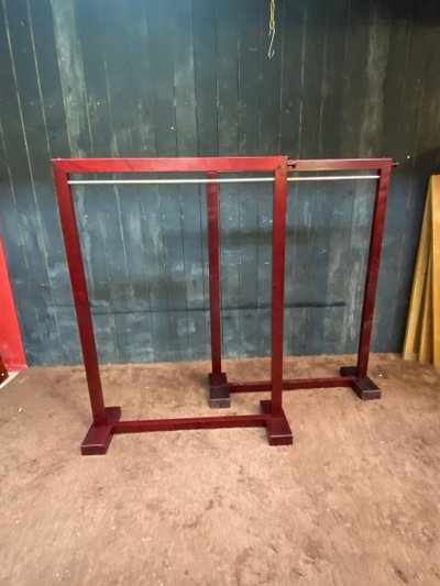 Due appendiabiti in legno tinto e ottone 1970/1980 ca.