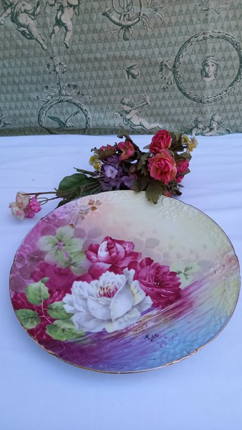 Decorative plates in Limoges porcelain from the 20th century