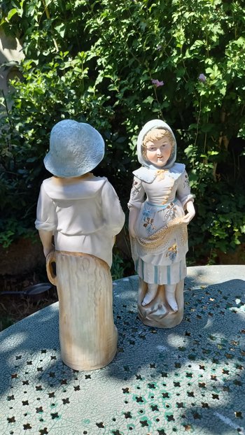 19th century porcelain biscuit statuettes