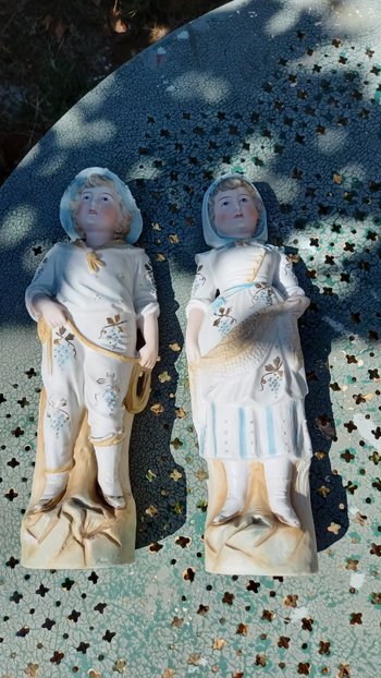 19th century porcelain biscuit statuettes