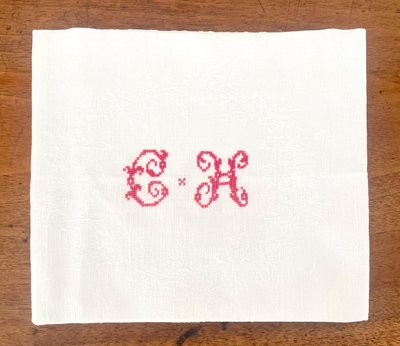 Antique white damask monogrammed embroidered tablecloth and its 12 napkins