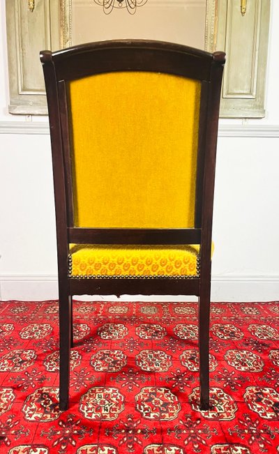 Fauteuil en bois sculpté avec velours jaune - Epoque Restauration - France