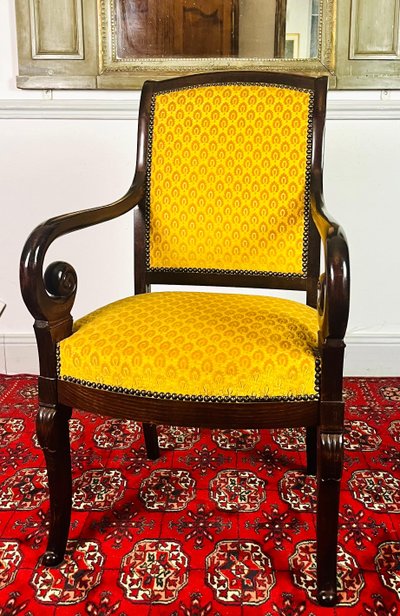 Fauteuil en bois sculpté avec velours jaune - Epoque Restauration - France