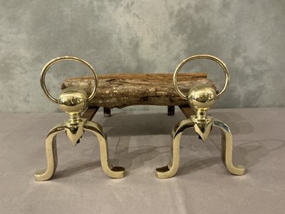 Pair of polished brass andirons circa 1970