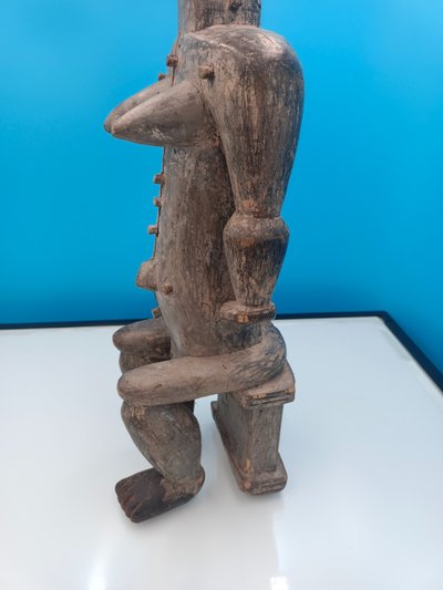 Senufo female anthropomorphic statuette seated on a stool