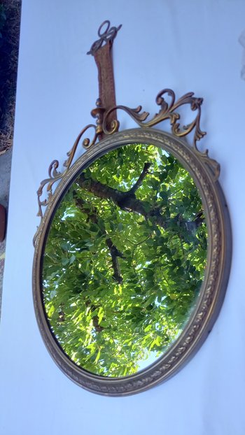 Round wall mirror in the Louis XV style (19th century)