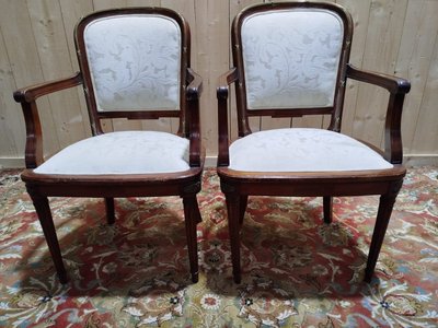 Suite de 8 chaises et paire de fauteuils Louis XVI