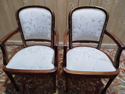 Suite de 8 chaises et paire de fauteuils Louis XVI