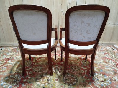 Suite de 8 chaises et paire de fauteuils Louis XVI