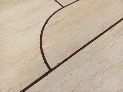 Vintage octagonal travertine coffee table with a geometric pattern from the 1970s
