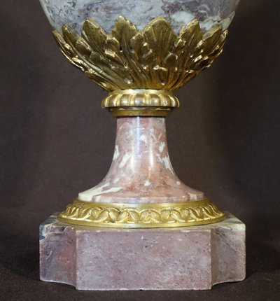 Pair Of Marble Covered Vases