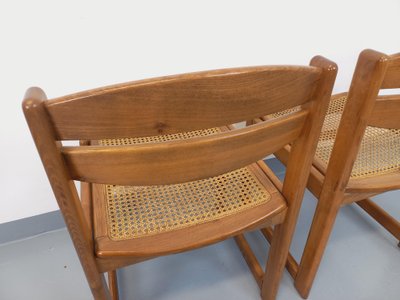Pair of vintage sleigh chairs in beech wood and caning from the 70s/80s