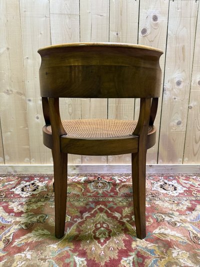 Fauteuil de bureau Louis Philippe en noyer et cannage