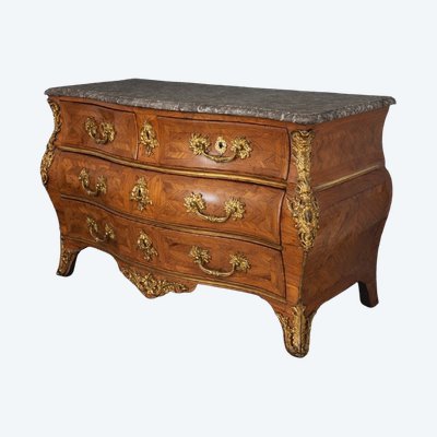 A bombé commode, known as a "tomb" commode, in marquetry and gilt bronze - Paris, circa 1750