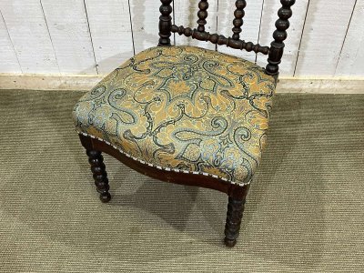Chaise en bois tourné et placage de palissandre, début XXème