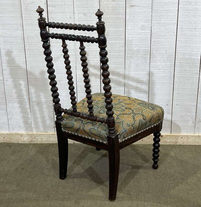 Chaise en bois tourné et placage de palissandre, début XXème