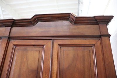 Large antique wardrobe in solid walnut, Italy Mid 19th century
