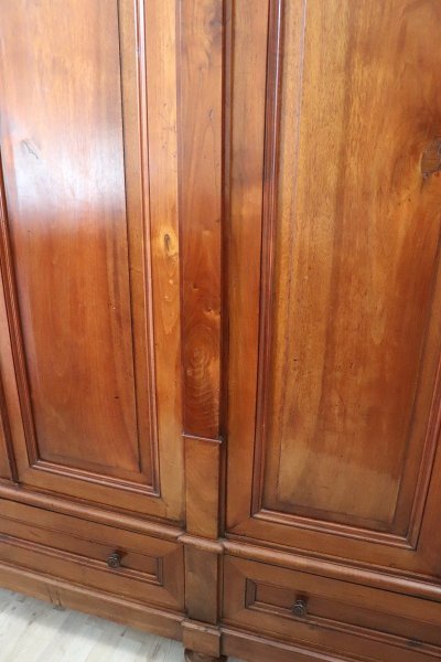 Large antique wardrobe in solid walnut, Italy Mid 19th century