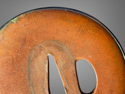 Tsuba maru-gata in suaka e shakudo - Periodo Edo (1603-1868).