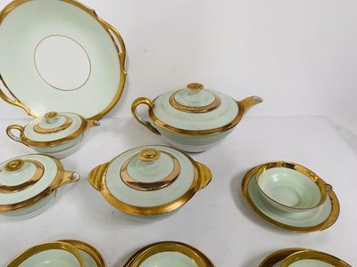 Coffee and tea service comprising 25 pieces in polychrome porcelain. 20th century.
