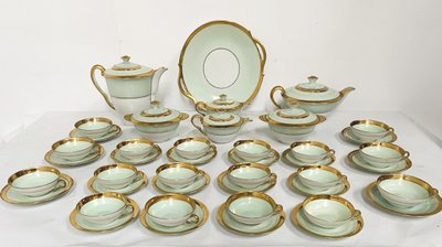 Coffee and tea service comprising 25 pieces in polychrome porcelain. 20th century.