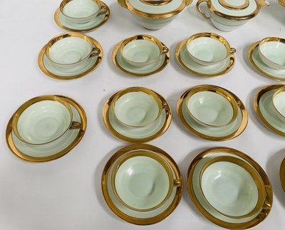 Coffee and tea service comprising 25 pieces in polychrome porcelain. 20th century.