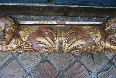 Beautiful carved wooden element with angel heads from the Louis XIV period of the 17th century