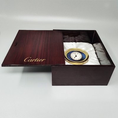Pendulette, magnifique réveil de bureau et de voyage Cartier des années 1960. Fabriquée en Suisse.